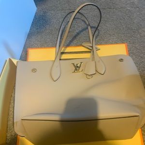 Authentic brand new never used Louis Vuitton bag